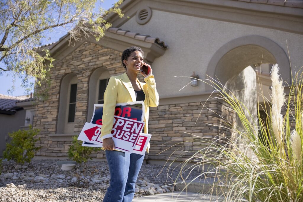 Real estate agent getting a house ready for sale